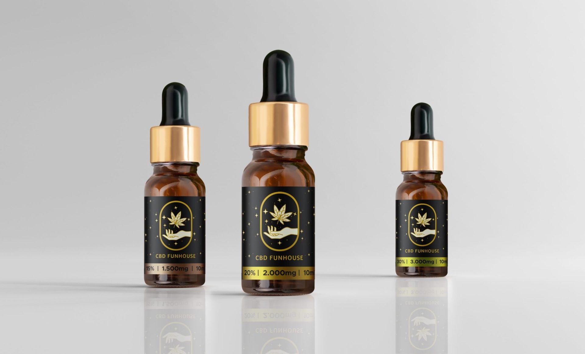 Set de trei flacoane de ulei CBD premium Funhouse în diverse dimensiuni.