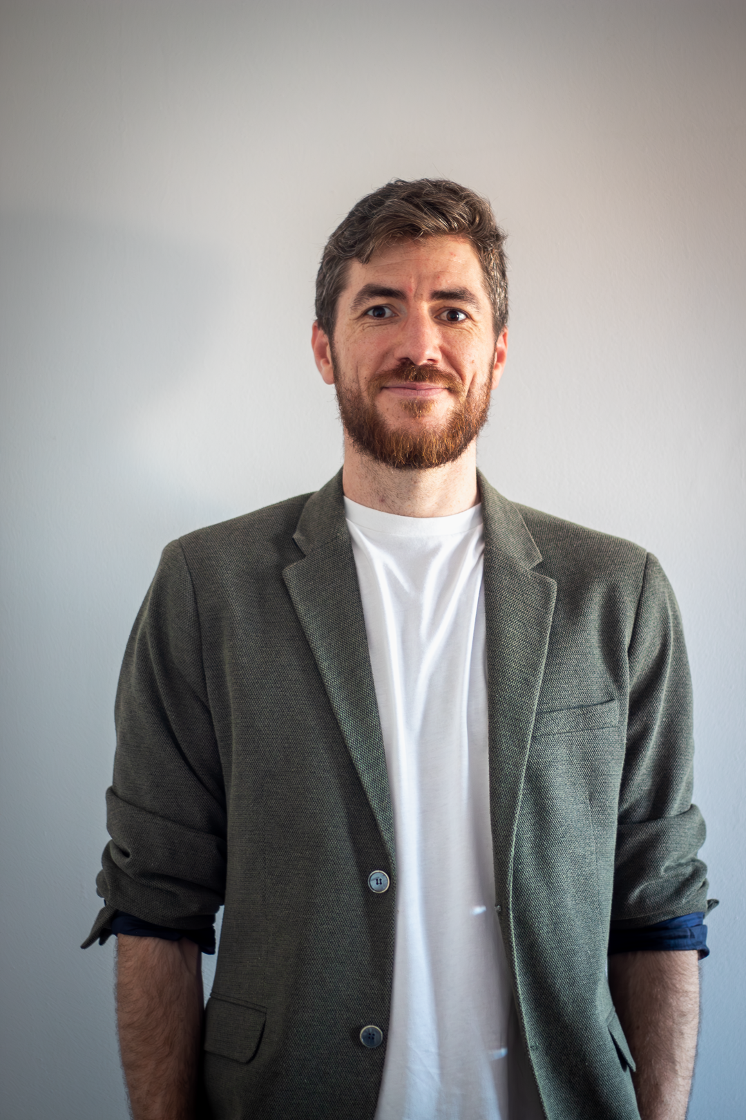 Man in blazer with beard